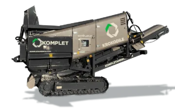 A tracked industrial machine labeled "KOMPLET KROKODILE"