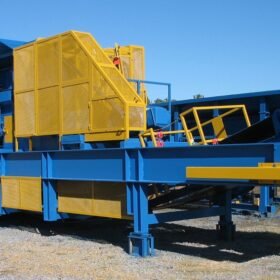 Large blue and yellow industrial portable jaw plant